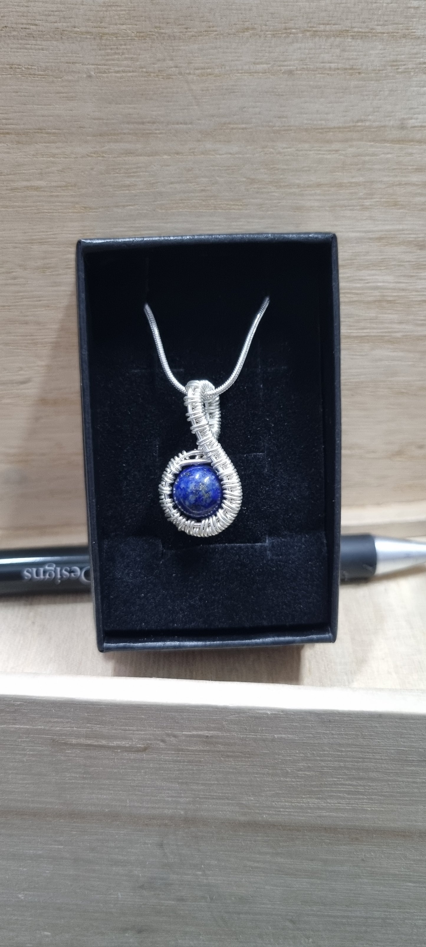 Wire woven lapis lazui pendant
