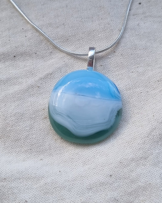 Ocean inspired, blue white and green, handmade glass pebble pendant