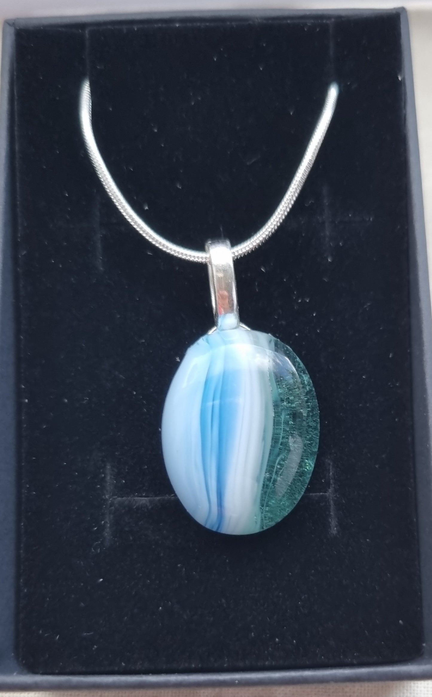 Ocean inspired, blue white and green, handmade glass pebble pendant