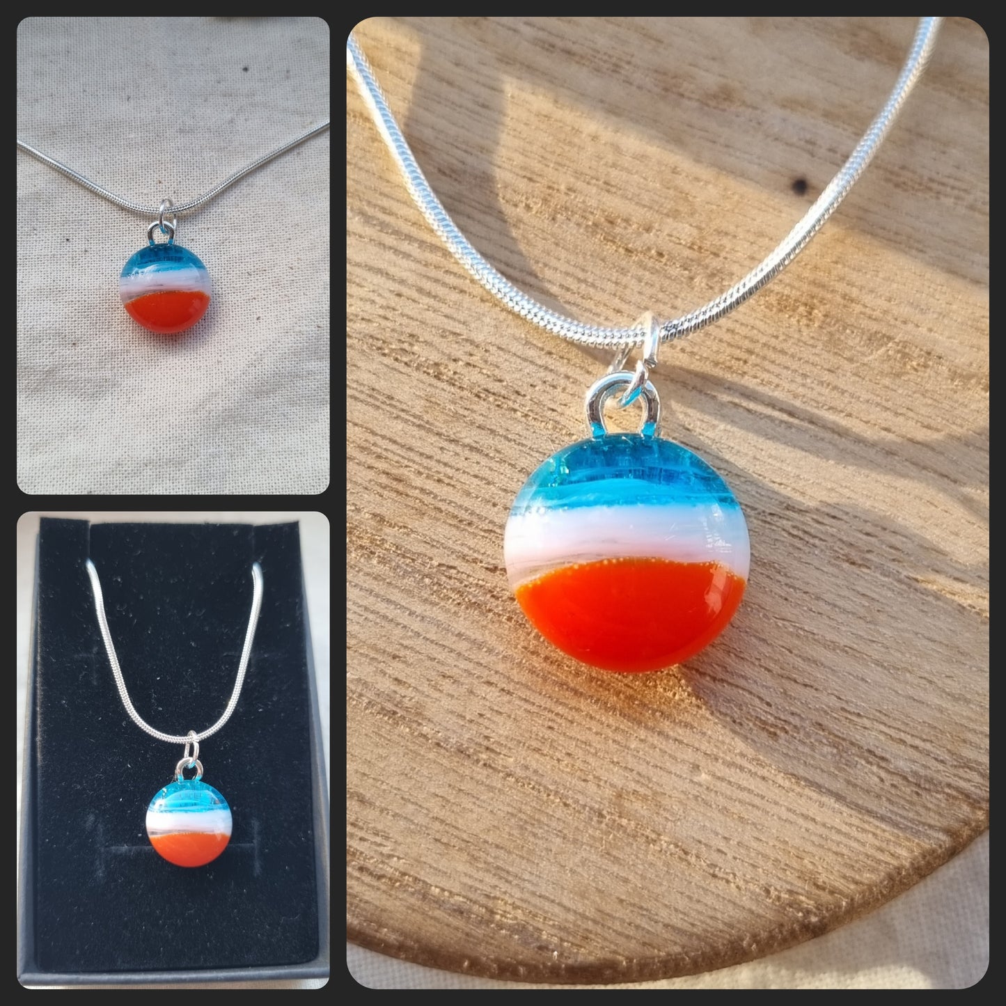 Blue, white and orange handmade glass pebble pendant.