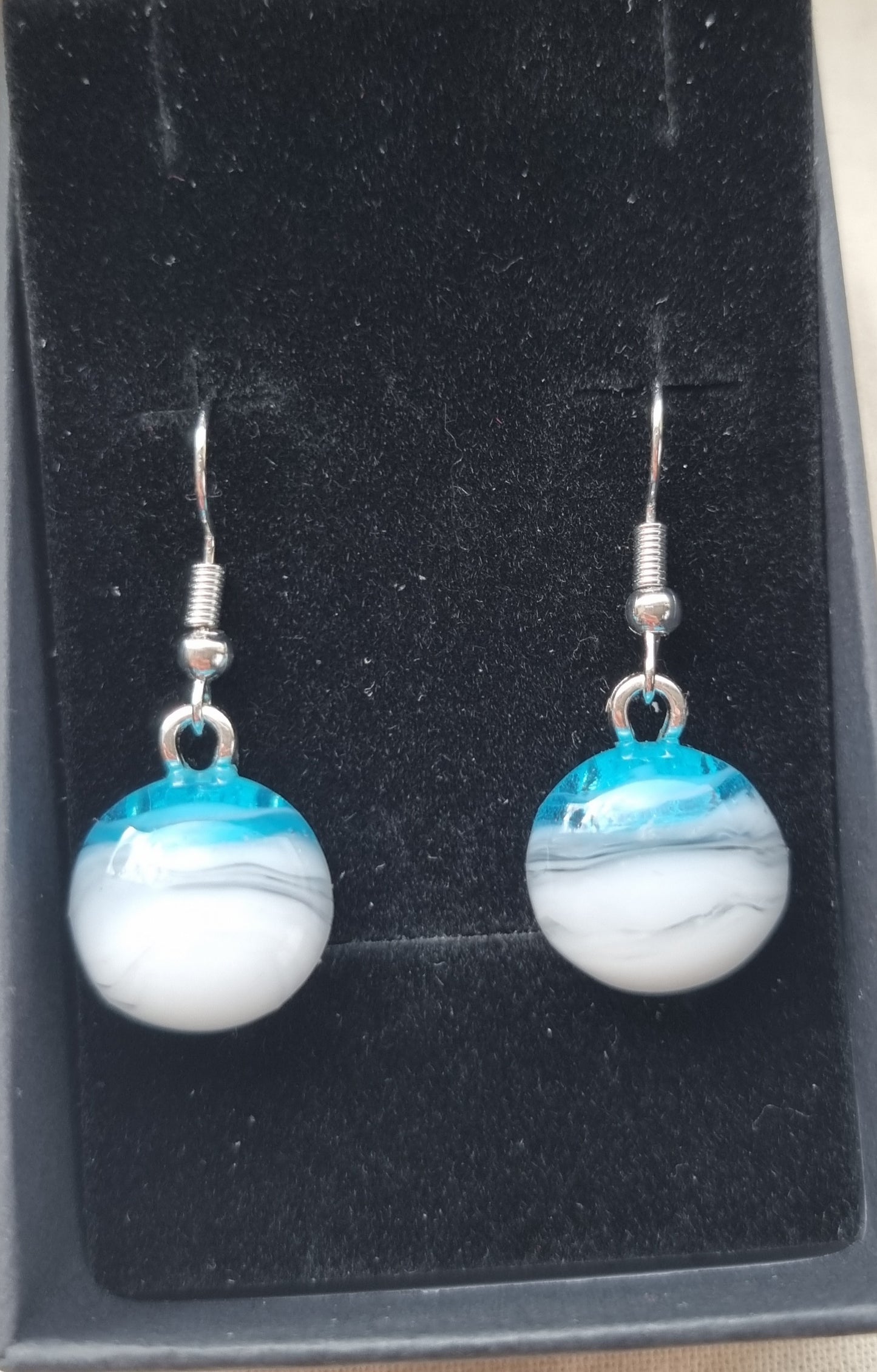 Blue, grey and white handmade glass pebble earrings.
