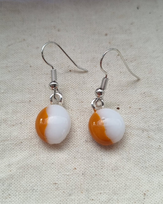 Orange and white, handmade glass pebble earrings
