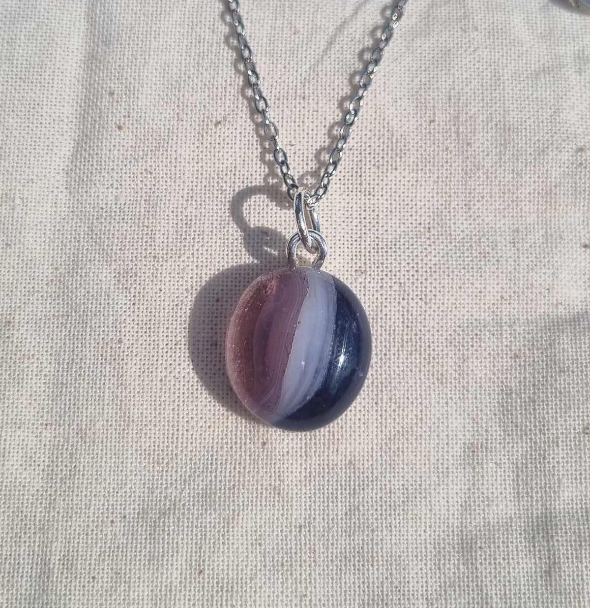 Shades of purple, handmade glass pebble pendant