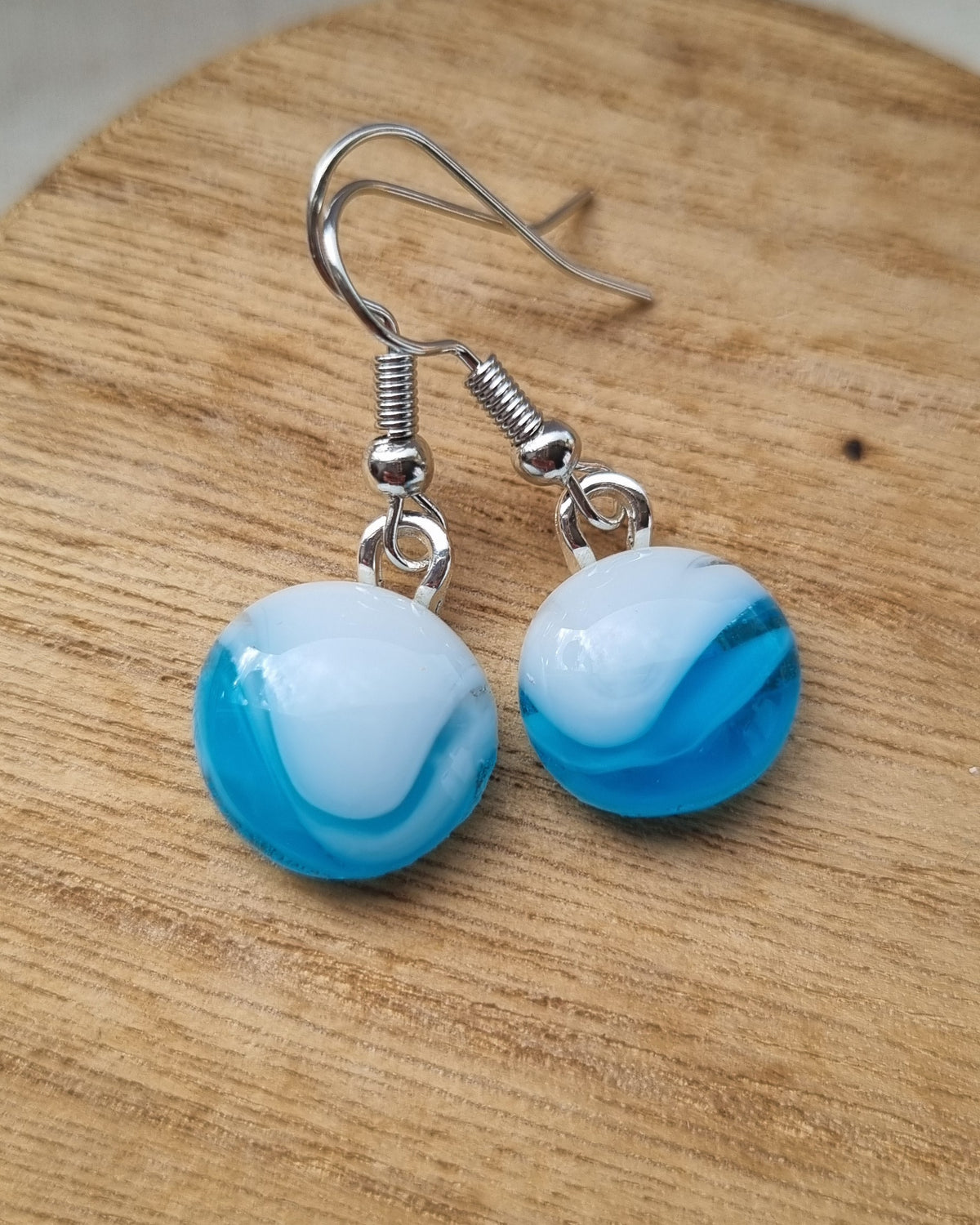 Blue and white handmade glass pebble earrings