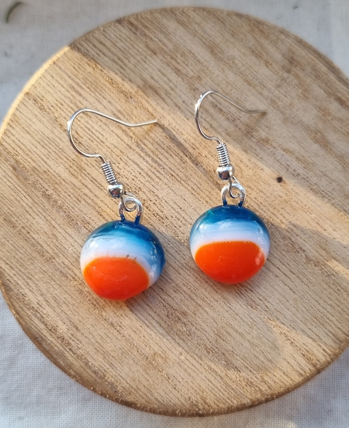 Blue, white and orange handmade glass pebble earrings