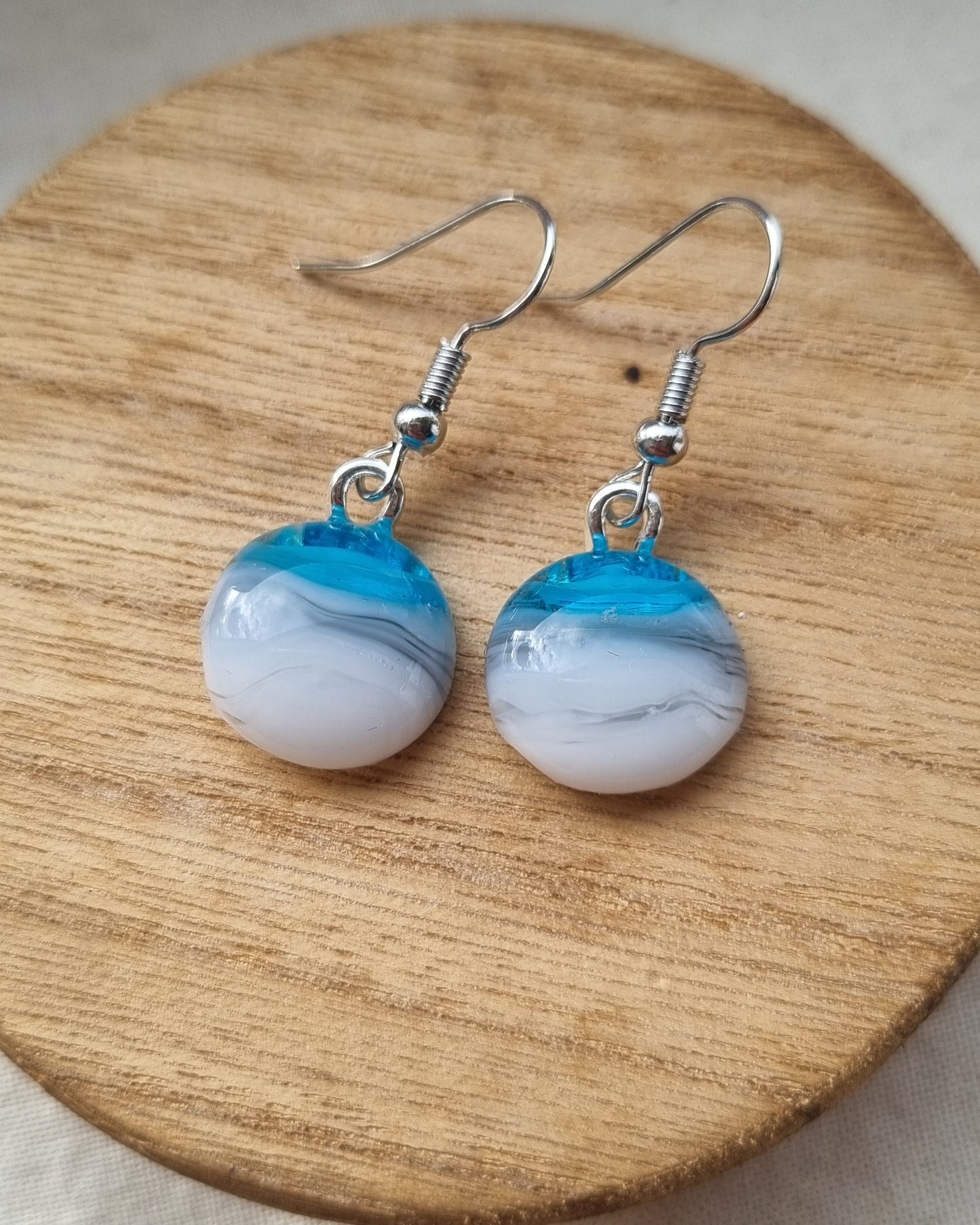 Blue, grey and white handmade glass pebble earrings.