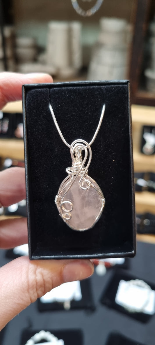 Handmade Rose quartz wire wrapped pendant.