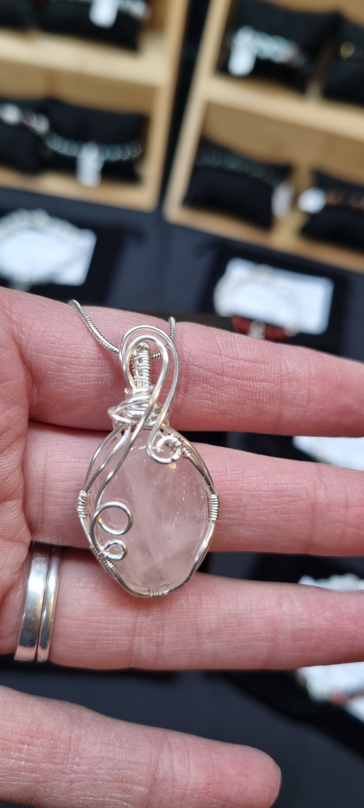 Handmade Rose quartz wire wrapped pendant.